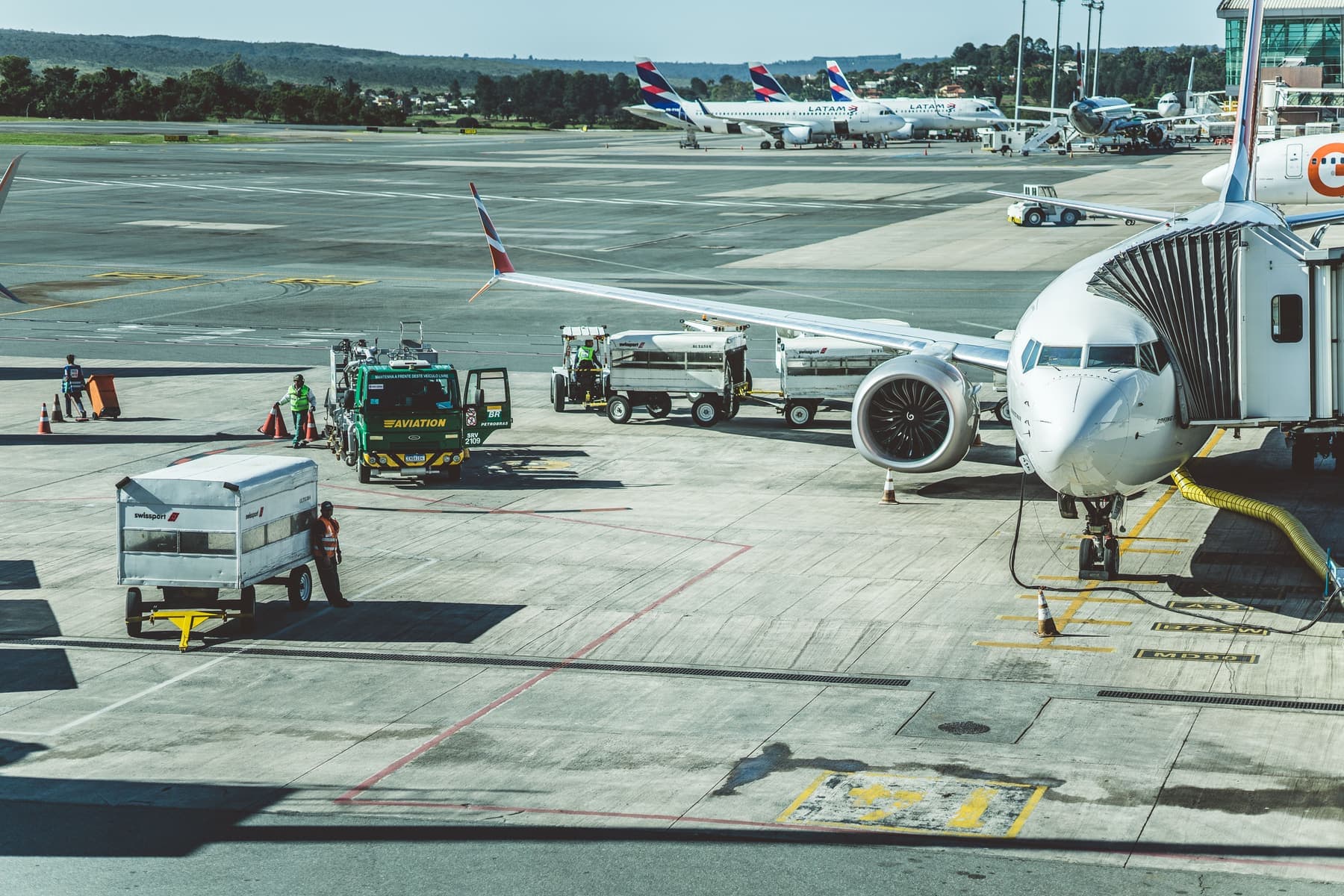 Airport jet bridge and apron on a clear day