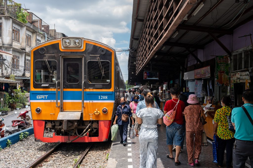 Made-up berths and curtains inside a Thai overnight sleeper train carriage
